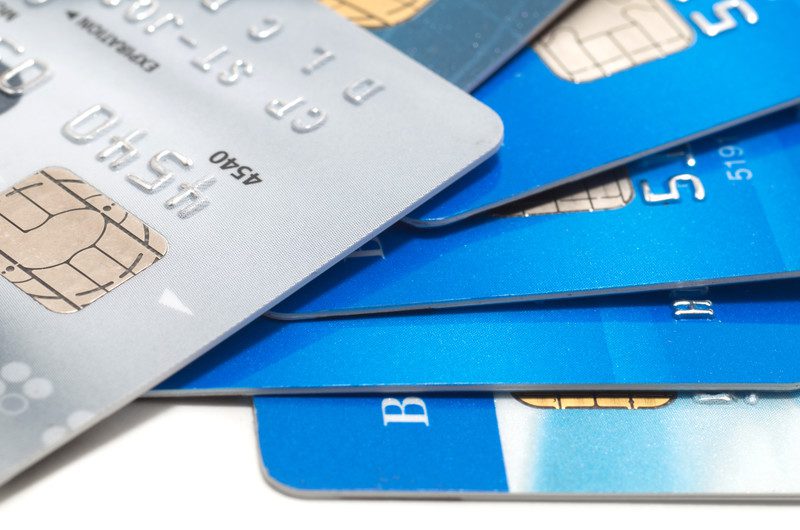 Online Personal Loans. A close up of several credit cards and their chips