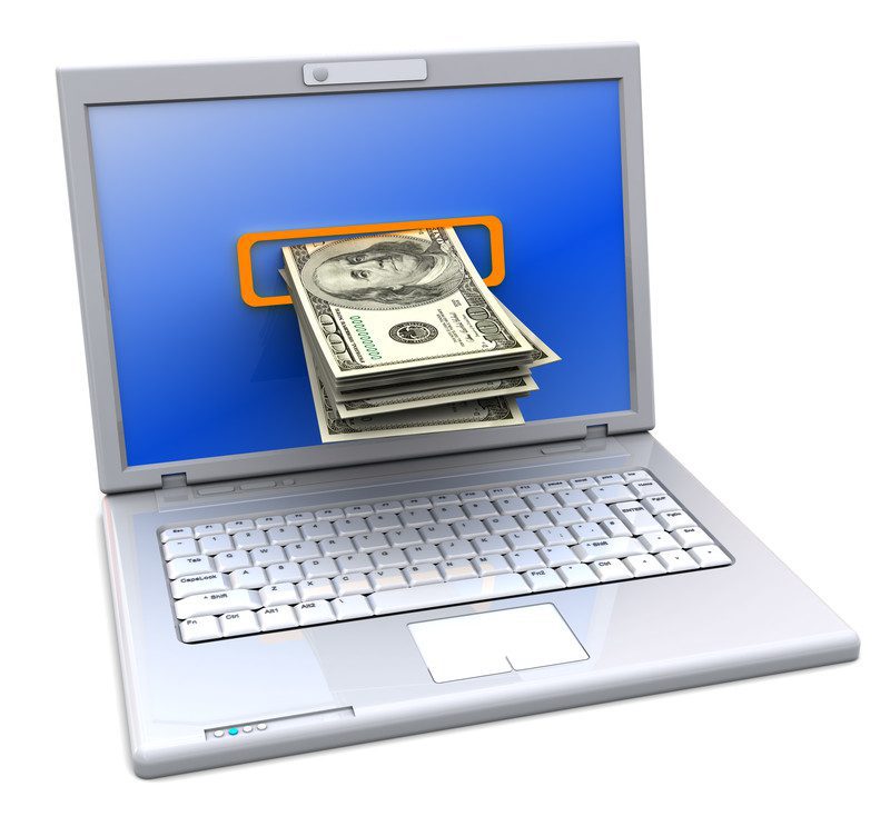 online signature cash loan. A laptop with money coming out of the screen